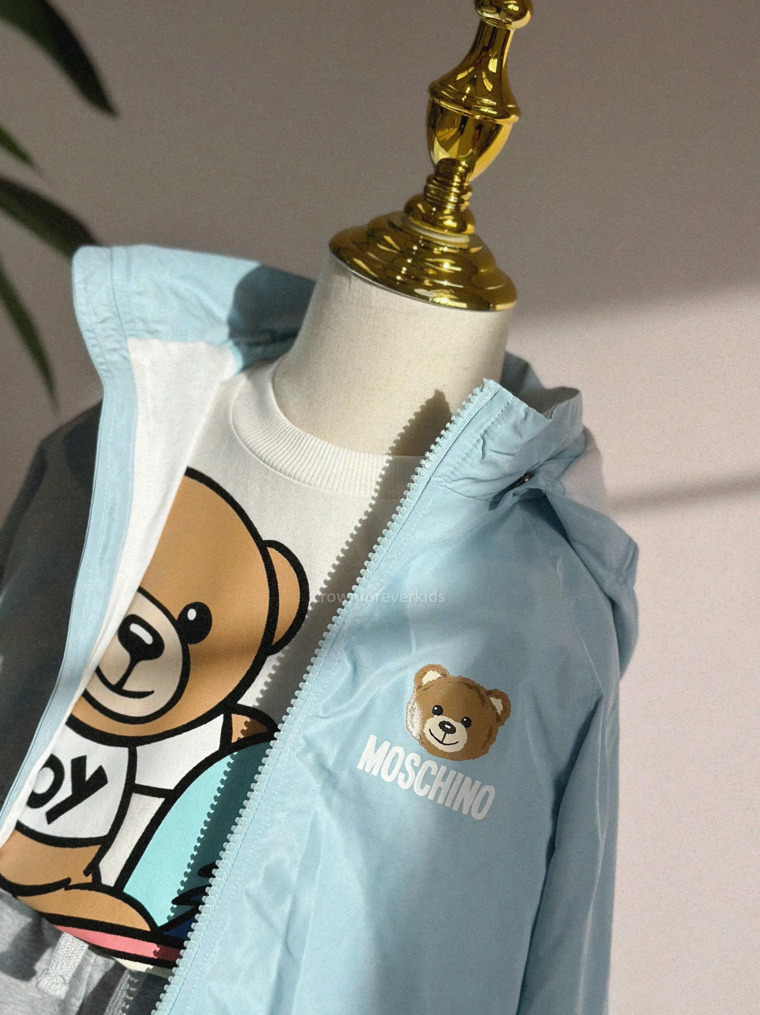 Moschino Jackets> Baby Bear Toy Rattle Hooded Jacket Baby Blue