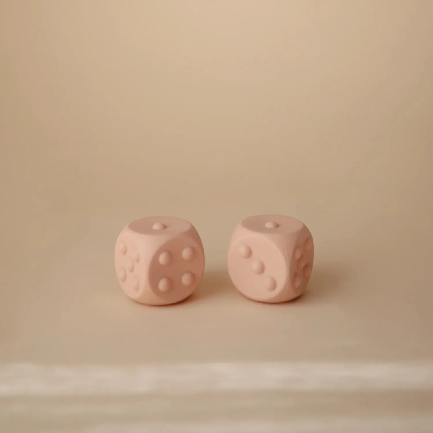 Mushie Face Masks> Dice Press Toy Blush/Shifting Sand